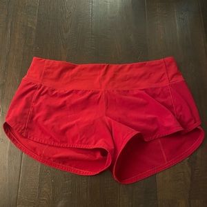 Size 6 red lululemon speed up short 2.5